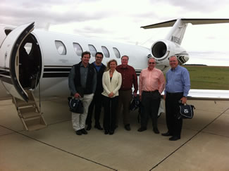 VT Industries Sales Representative and Anderson Lock Team in Front of VT Industries Corporate Jet
