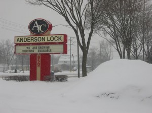 Anderson Lock is growing...and so is the pile of snow next to our sign!