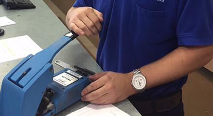 Thomas Didier Operating Pro-Lok Blue Punch Key Machine in Anderson Lock Showroom