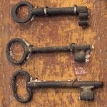 Keys mounted on wooden wall