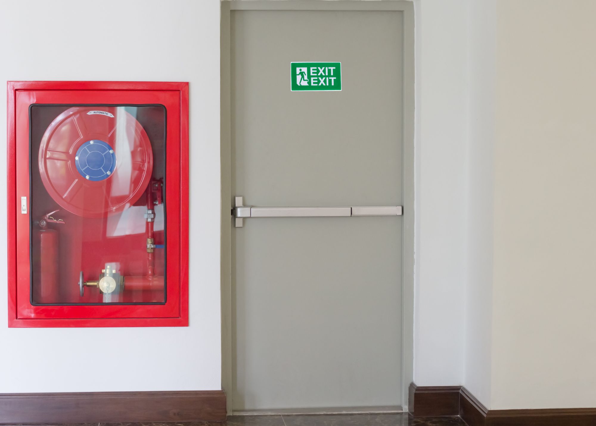 Commercial fire-rated door and frame in a school corridor