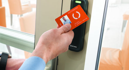 Electronic access control lock installed on a building door